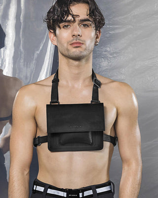 Model wearing the MYL BERLIN harness body belt bag in black saddle leather