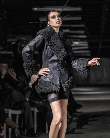 STRUCTURED FAUX FUR JACKET - Fitted jacket with sculptural volume and textured contrast