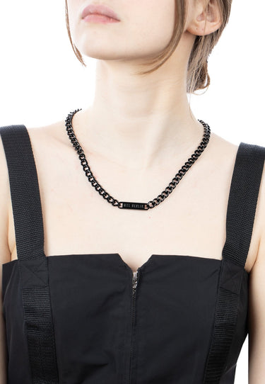 Model wearing black curb chain necklace, unisex stainless steel jewelry by MYL BERLIN