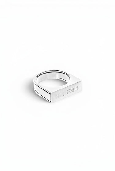 MYL BERLIN silver signet ring with a shiny IP coating and a two-part design for interchangeable inner rings.
