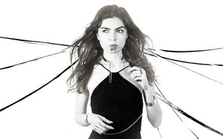 Model wearing MYL BERLIN stainless steel choker, lip cuff, cuffs and rings