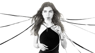Model wearing MYL BERLIN stainless steel choker, lip cuff, cuffs and rings