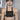 Model wearing the MYL BERLIN harness body belt bag in black saddle leather