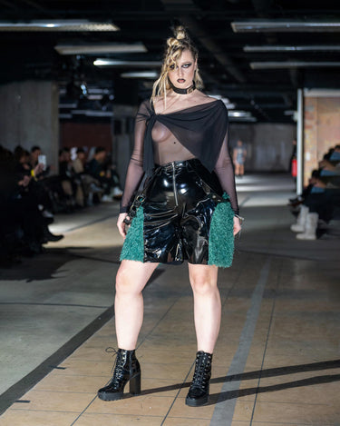 SYNAPSE Fur Shorts High-shine patent shorts with faux fur side panels