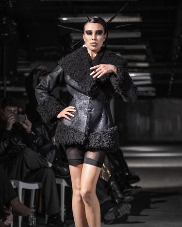STRUCTURED FAUX FUR JACKET - Fitted jacket with sculptural volume and textured contrast